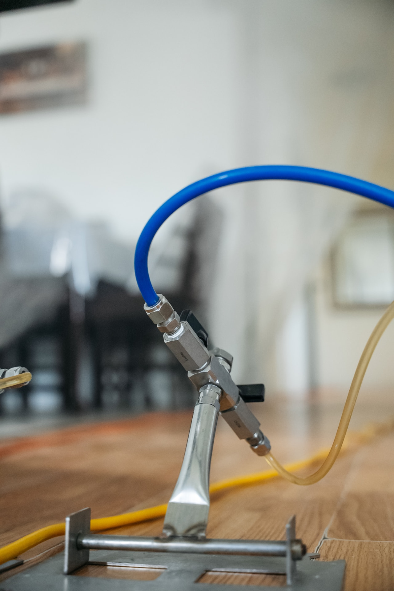 Close-up of the dry-fog manifold and supply lines